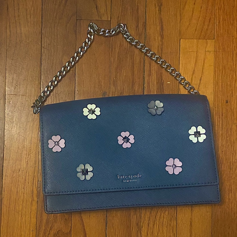 Kate Spade navy bag with pastel flowers.